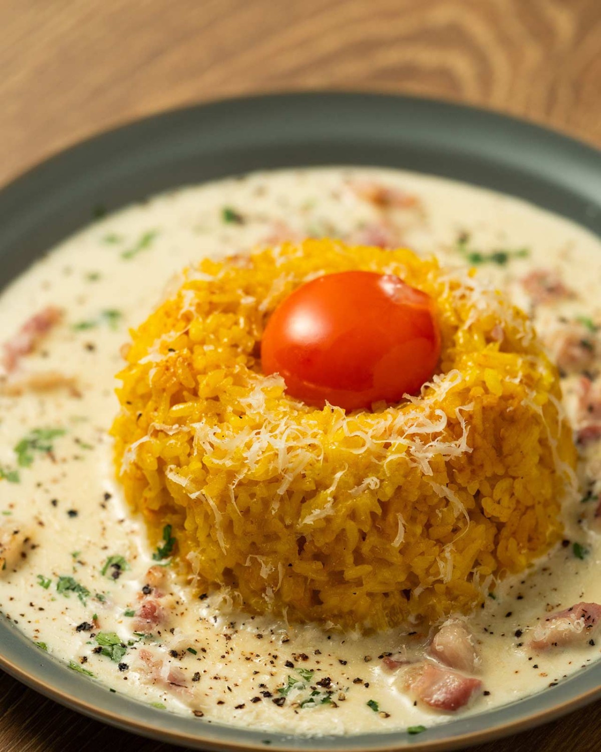 鳥取県鳥取市の『食堂FRUNK』の「龍のたまごとパンチェッタのライスカルボナーラ」